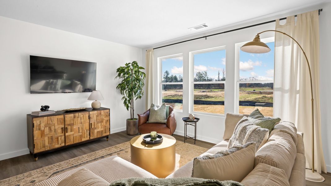 Furnished interior in a model home at Evergreen Landing in Rossville (Image 9).