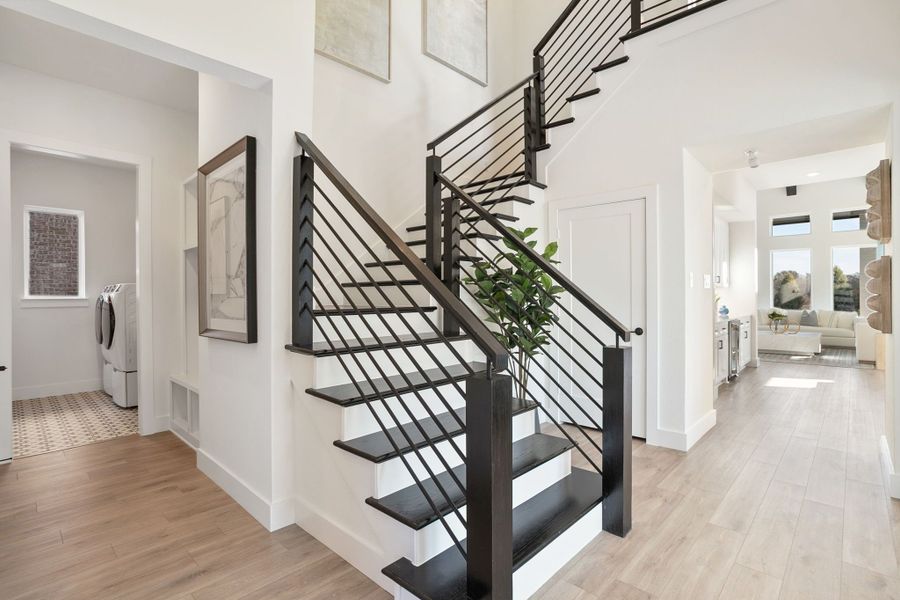 Furnished interior in a model home at Lily Creek at Sutton Fields in Aubrey (Image 102).