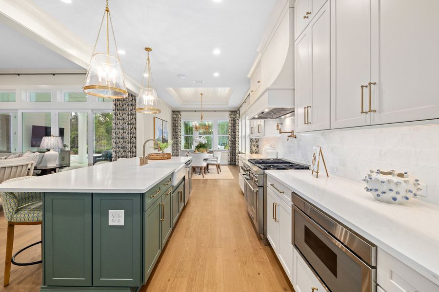 Furnished interior in a model home at Hidden Creek at SilverLeaf 80' Gold Series in St. Augustine (Image 57).