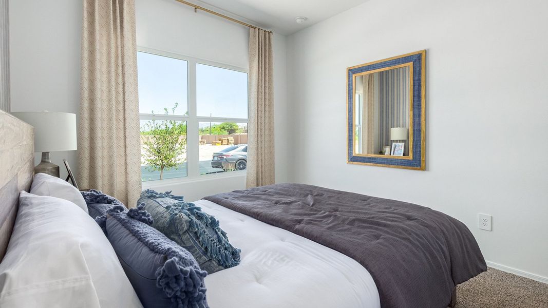 Furnished interior in a model home at Casas del Cerrito in Tucson (Image 31).