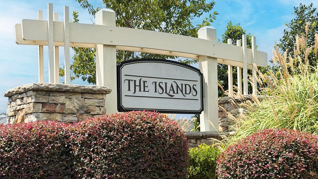 Entrance to the The Islands community in Beech Island, SC, featuring signage and landscaping (Image 1). Entrance to the The Islands community in Beech Island, SC, featuring signage and landscaping (Image 1).