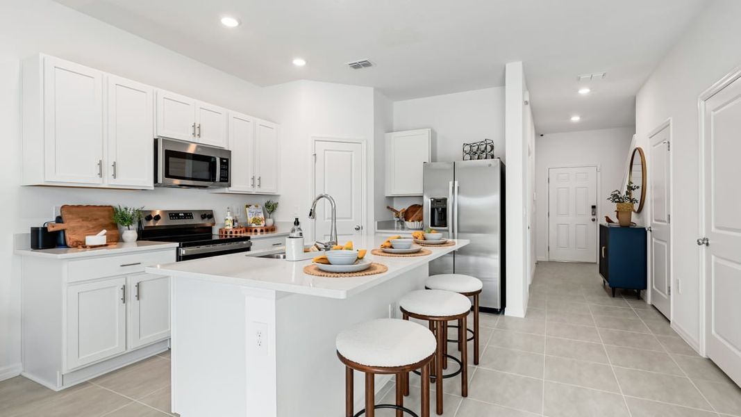 Furnished interior in a model home at The Towns at Skye Ranch in Sarasota (Image 35).