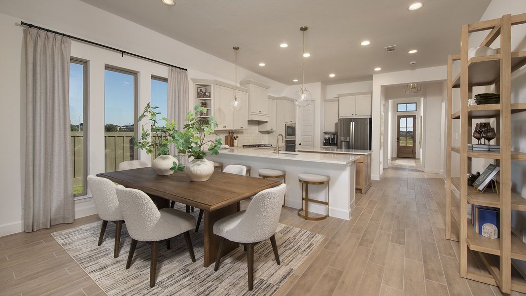 Furnished interior in a model home at Cross Creek West 45' in Fulshear (Image 8).