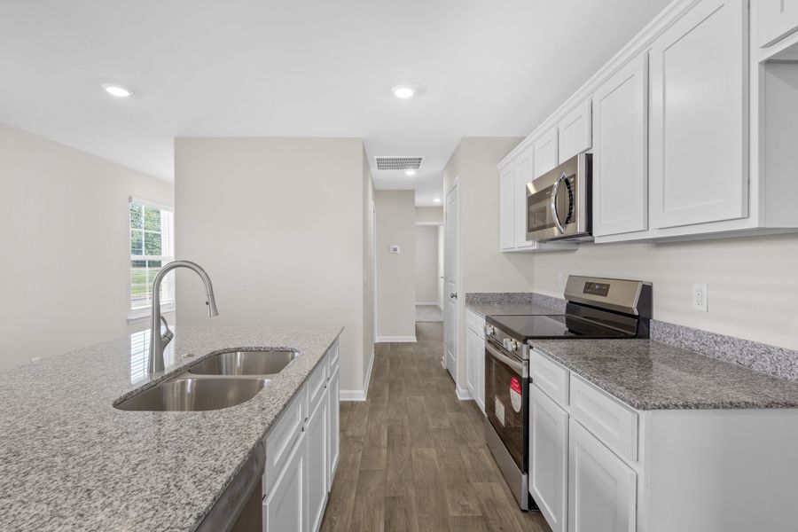 Furnished interior in a model home at South Welcome in Greenville (Image 9).