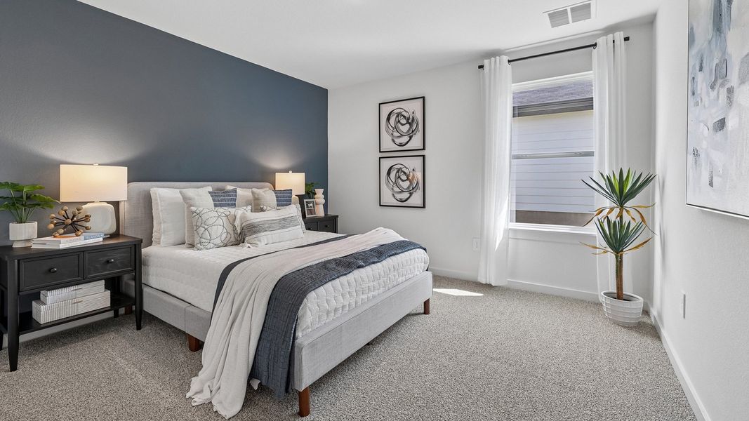 Furnished interior in a model home at Monarch Ranch in Manor (Image 39).