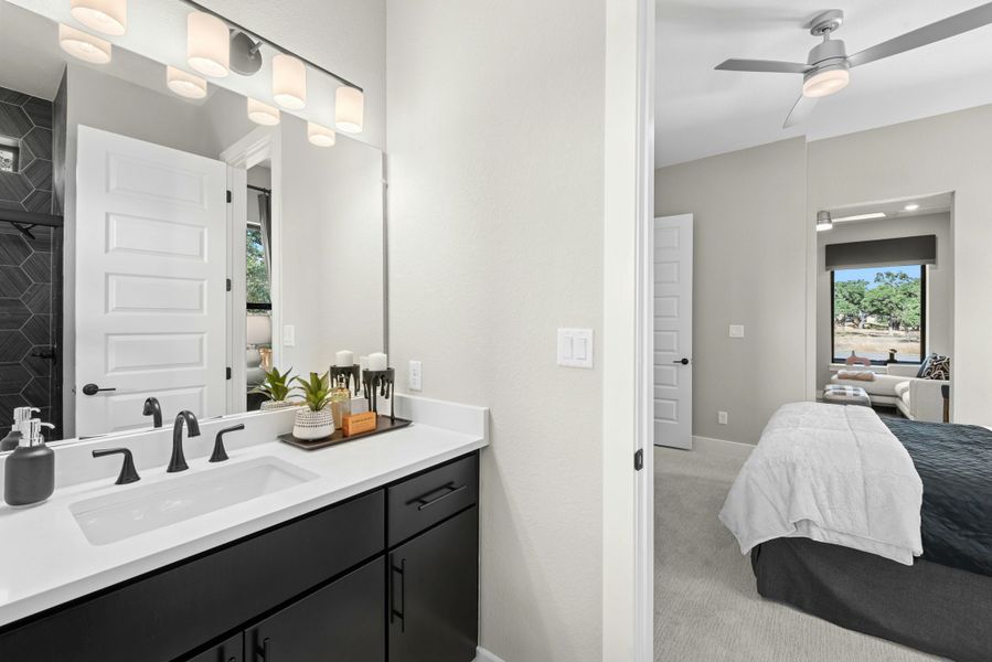 Furnished interior in a model home at Caliterra in Dripping Springs (Image 48).