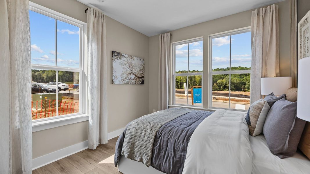 Furnished interior in a model home at The River District Townhomes in Charlotte (Image 5).