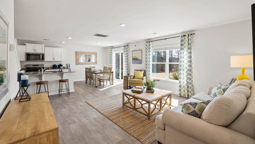 Furnished interior in a model home at Paddock Point in Roebuck (Image 9).