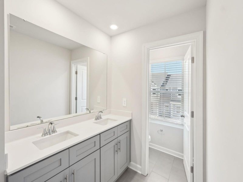 Furnished interior in a model home at Crossrail Station in Mooresville (Image 13).