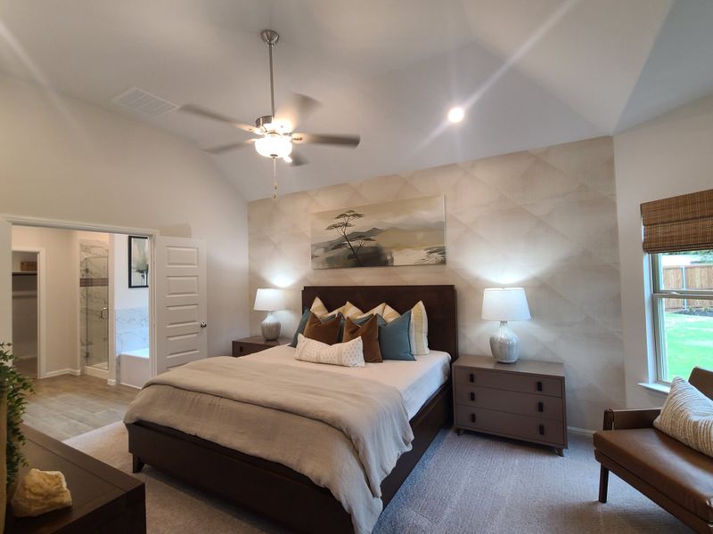 A cozy bedroom with neutral decor, featuring a plush bed, modern art, and ample natural light. Ideal relaxation space. A cozy bedroom with neutral decor, featuring a plush bed, modern art, and ample natural light. Ideal relaxation space.