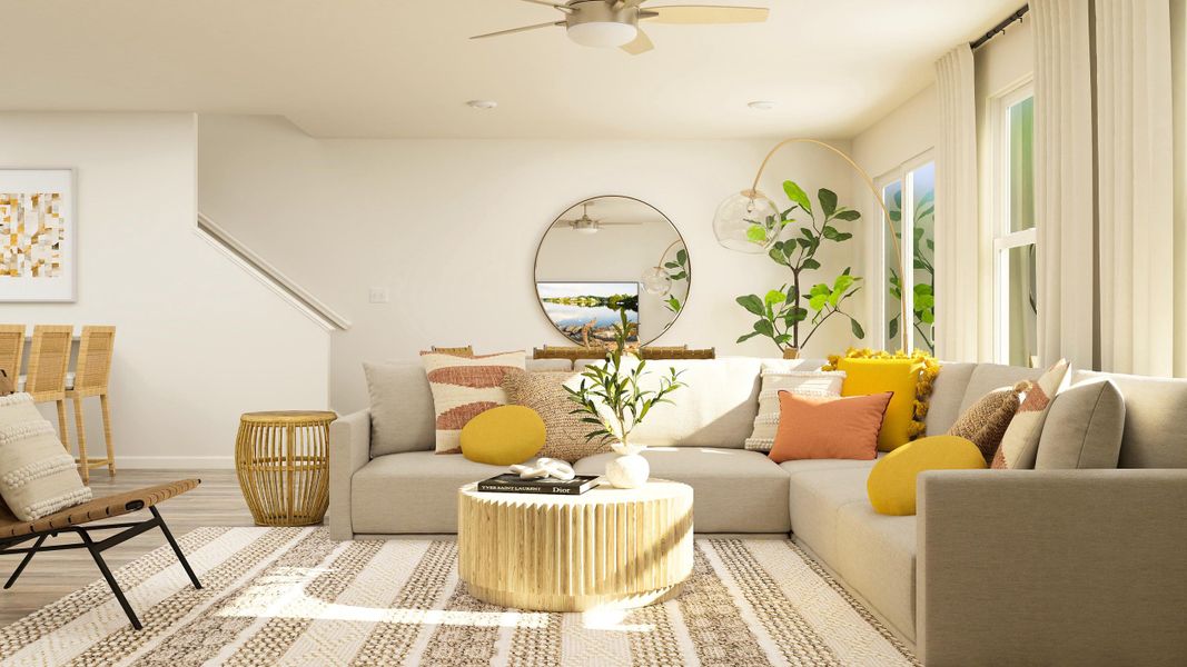 A living room with a large mirror.
