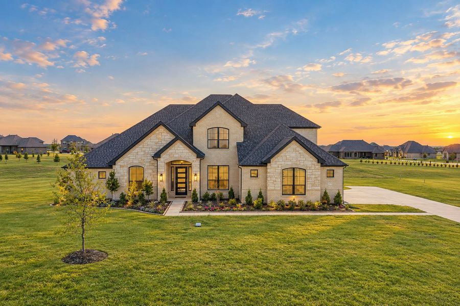Front exterior of a home in the Berkshire Estates community, located in Mesquite, TX (Image 2).