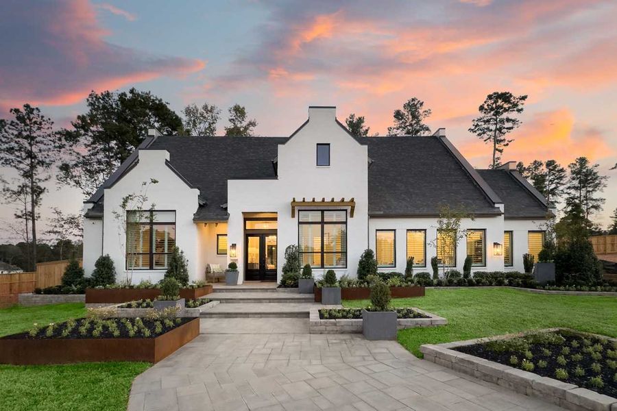 Front exterior of a home in the The Woodlands Hills community, located in Willis, TX (Image 3). Front exterior of a home in the The Woodlands Hills community, located in Willis, TX (Image 3).