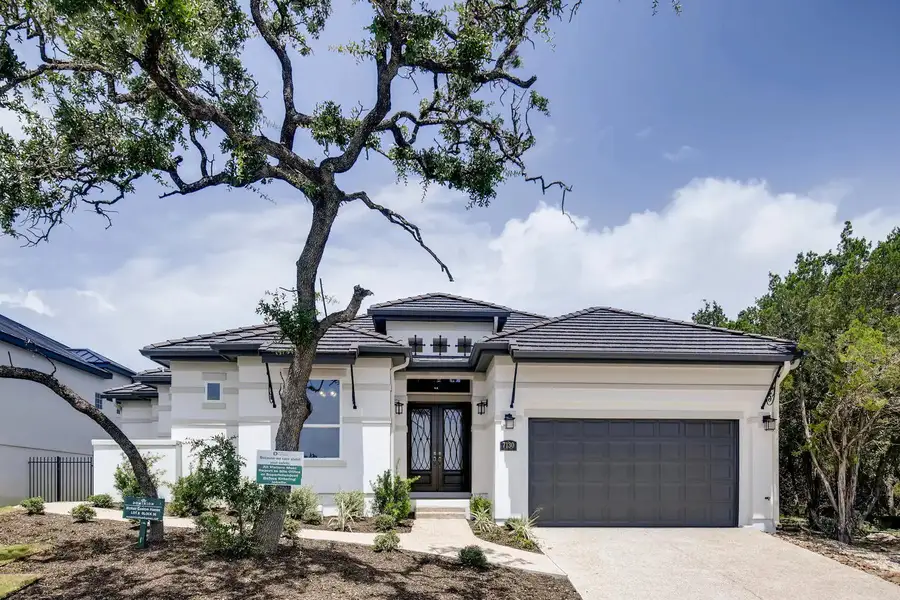 Front exterior of a home in the The Bluff At The Dominion community, located in Shavano Park, TX (Image 9).