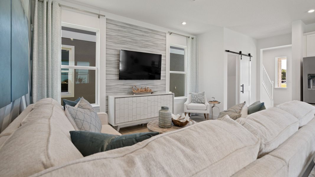 Trinity Place Staged Model Ambersweet Living Area by DRB Homes in Saint Cloud FL Trinity Place Staged Model Ambersweet Living Area by DRB Homes in Saint Cloud FL