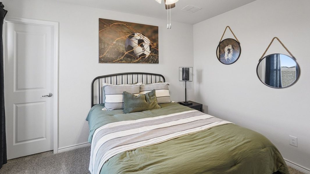 Furnished interior in a model home at The Woods at Lindsey Place in Anna (Image 41).