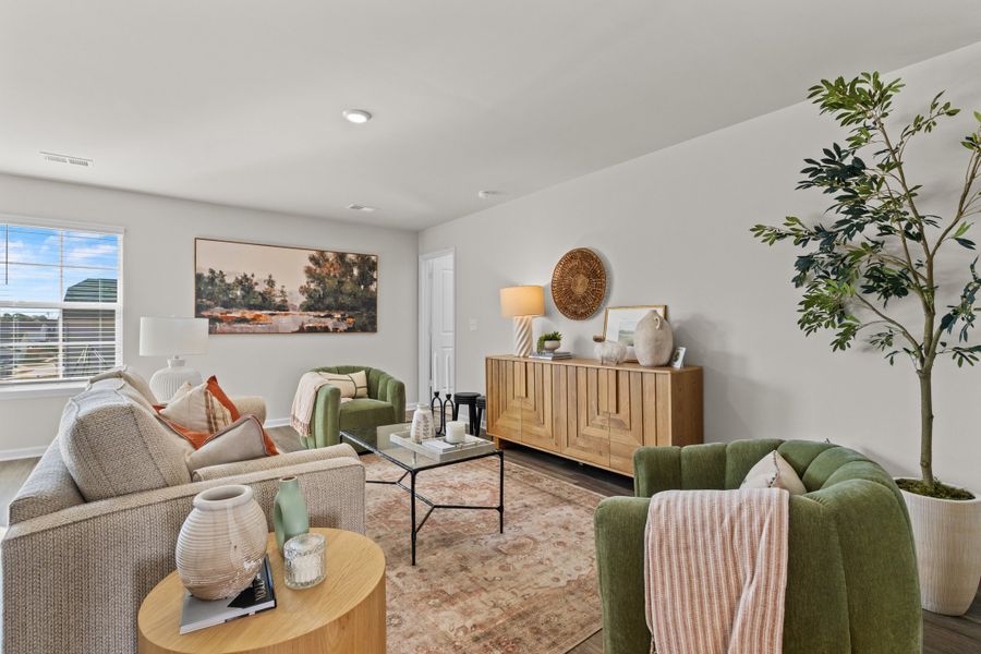 Furnished interior in a model home at Canary Woods in Hopkins (Image 6).