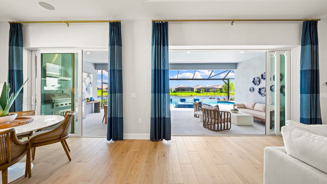 Furnished interior in a model home at Esplanade by the Islands in Naples (Image 49).