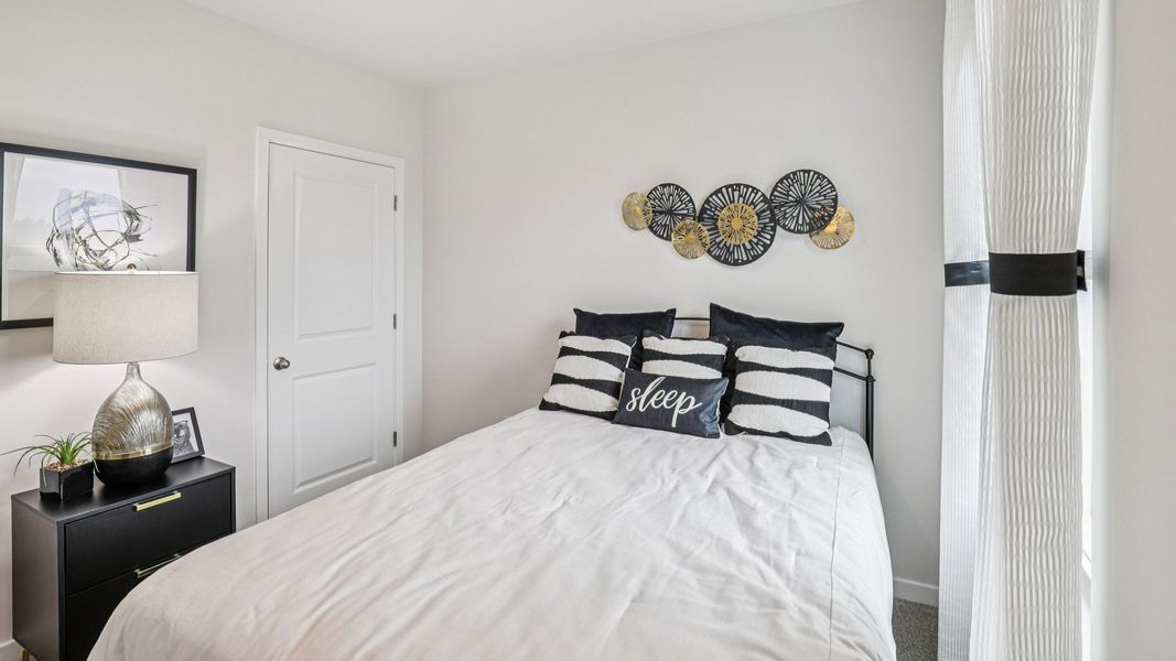 Furnished interior in a model home at Seagrass in Punta Gorda (Image 28).