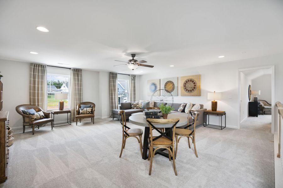 Furnished interior in a model home at Providence Creek in Fuquay Varina (Image 8).