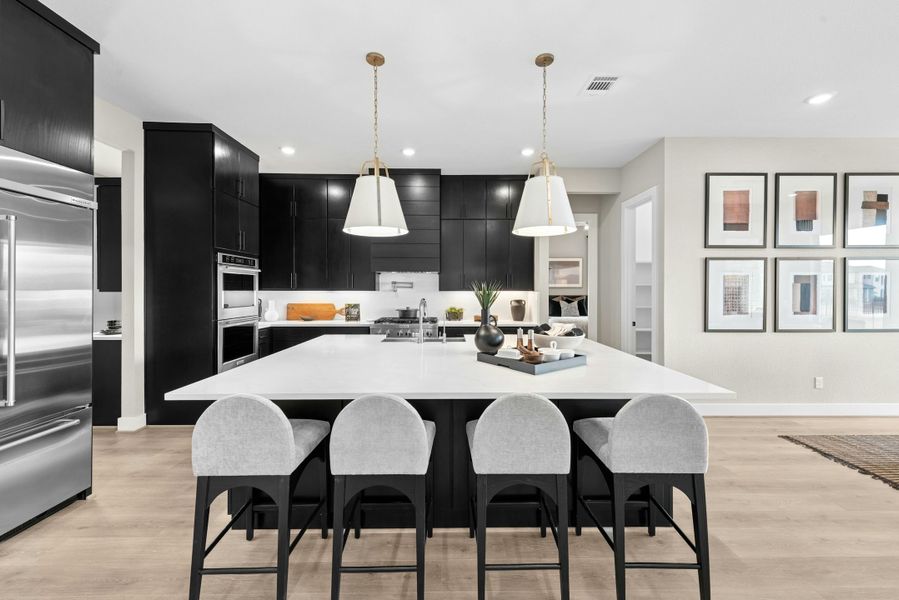 Furnished interior in a model home at Caliterra in Dripping Springs (Image 28).