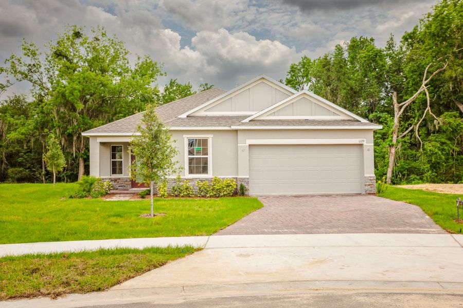 Front exterior of a home in the Palm Bay community, located in Palm Bay, FL (Image 2).