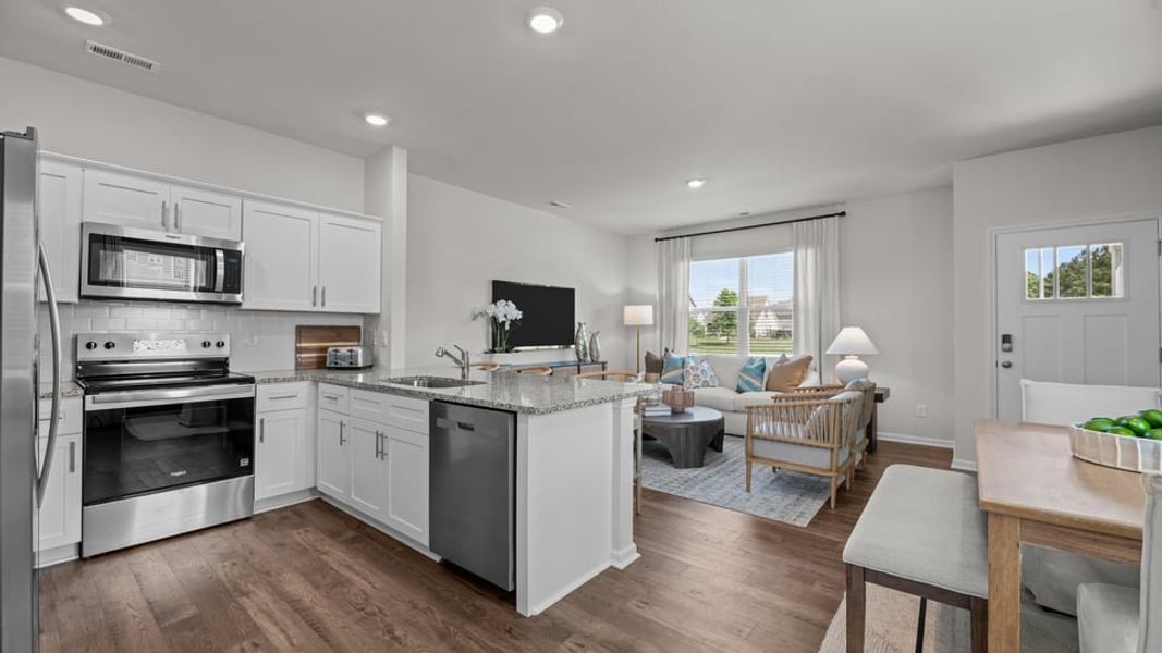 Furnished interior in a model home at Clock Road Townhomes in New Bern (Image 4).