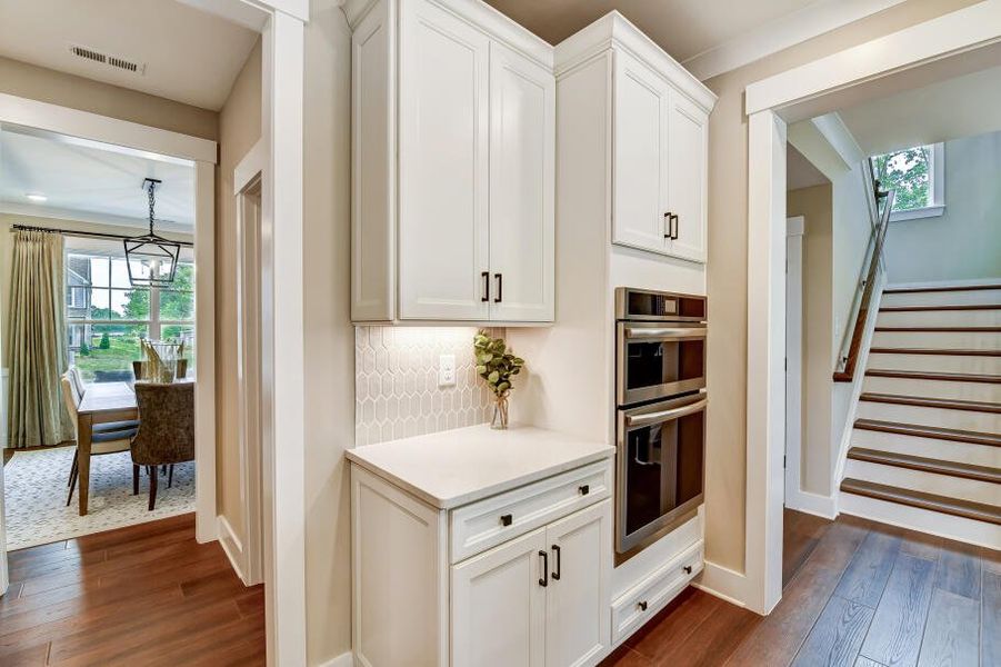 Furnished interior in a model home at Twin Creek Forsyth in Kernersville (Image 27).