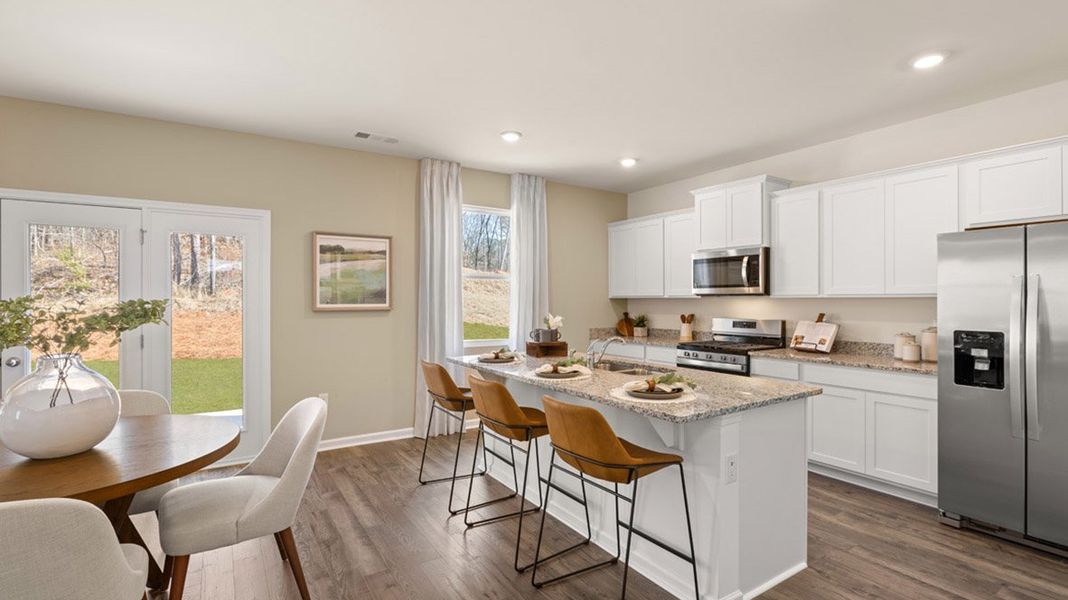 Furnished interior in a model home at Brooks Village in Dacula (Image 5).