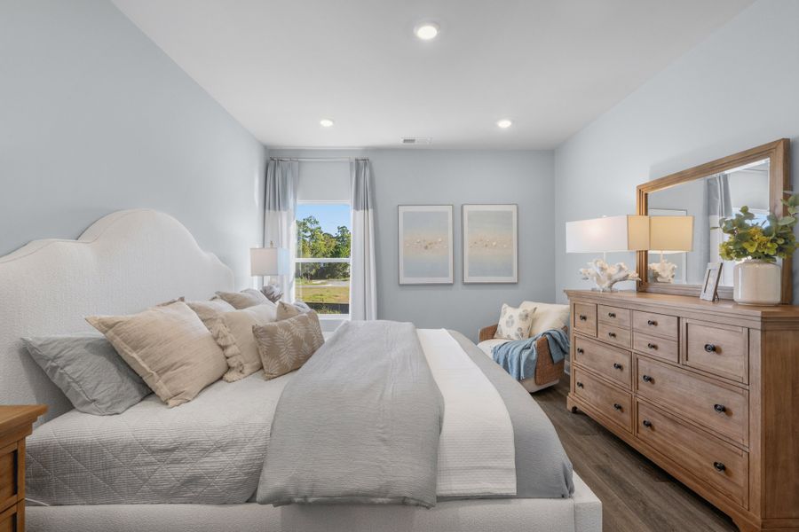 Furnished interior in a model home at Creekview Landing in Shallotte (Image 9).