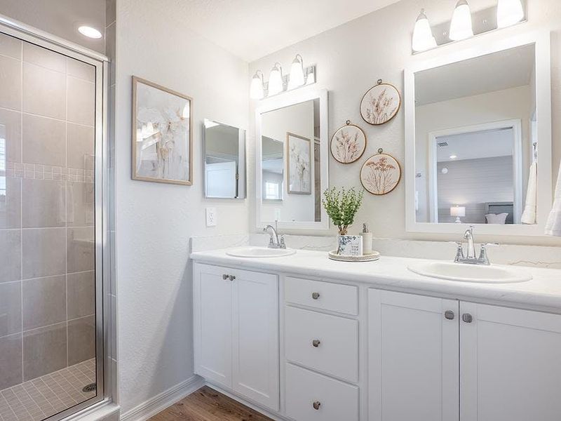 Your suite is complete with a large en-suite bath - Aria model home in St. Cloud, FL Your suite is complete with a large en-suite bath - Aria model home in St. Cloud, FL