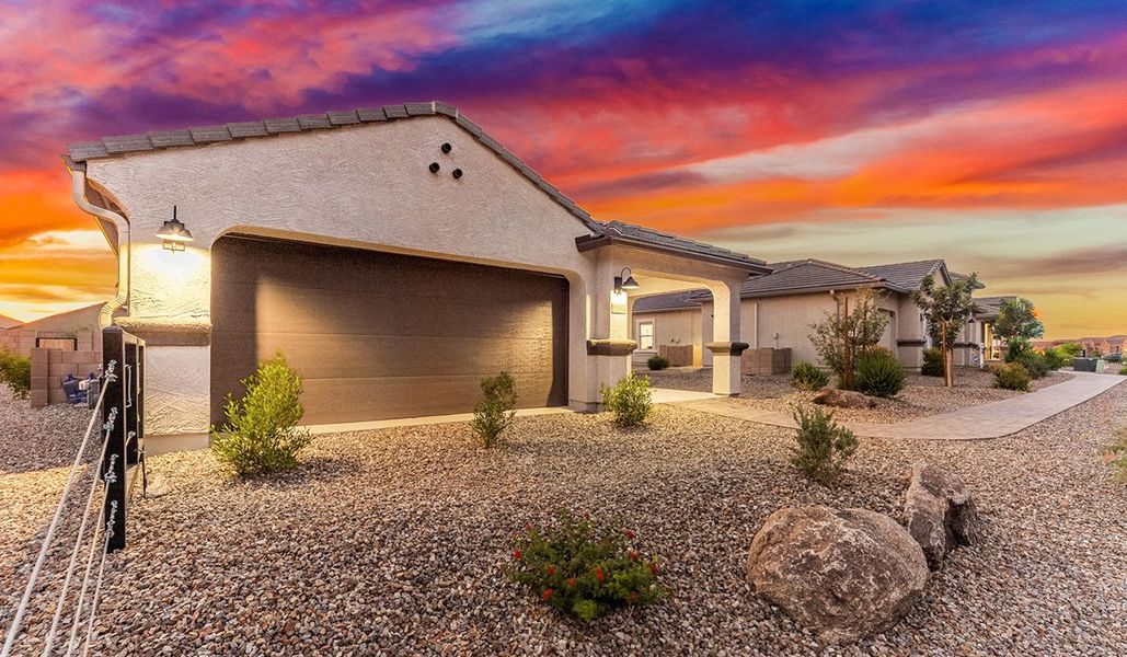 Front exterior of a home in the Saguaro Bloom community, located in Marana, AZ (Image 4). Front exterior of a home in the Saguaro Bloom community, located in Marana, AZ (Image 4).