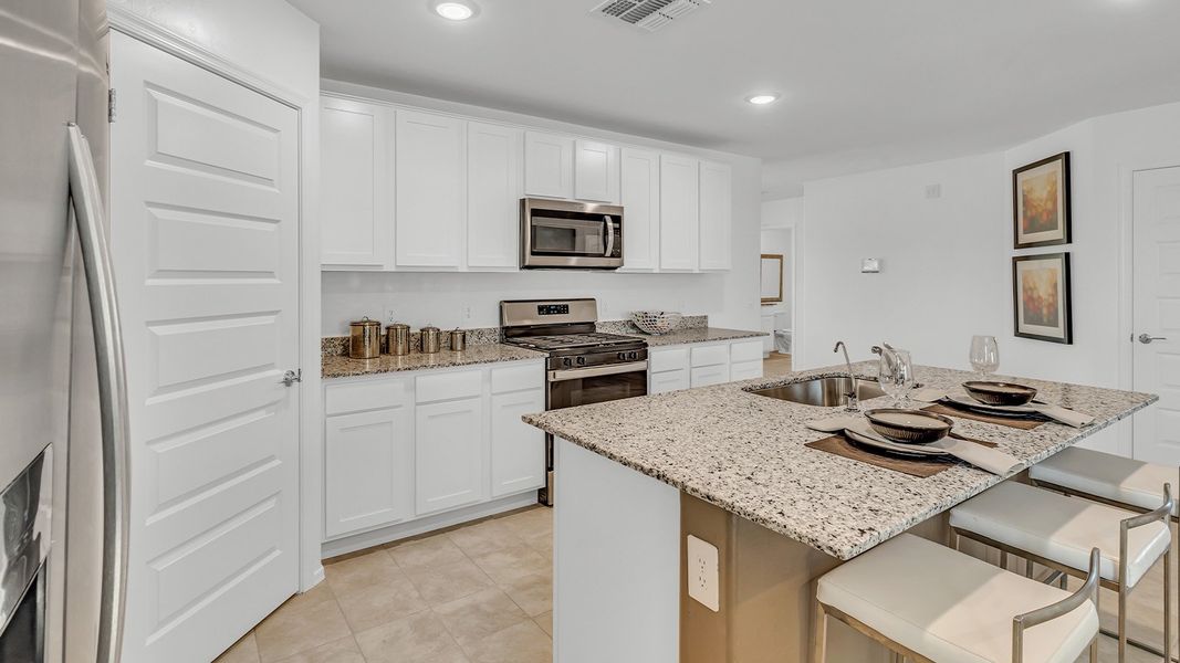 Furnished interior in a model home at Senita Crossing in Tucson (Image 19).