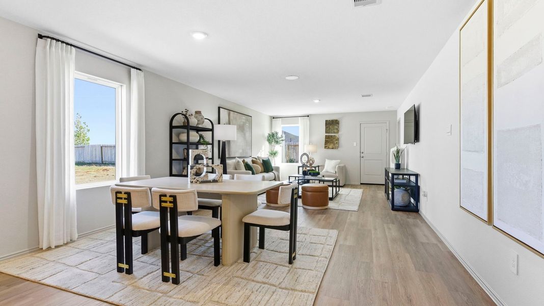 Furnished interior in a model home at Watermark in Alvin (Image 18).