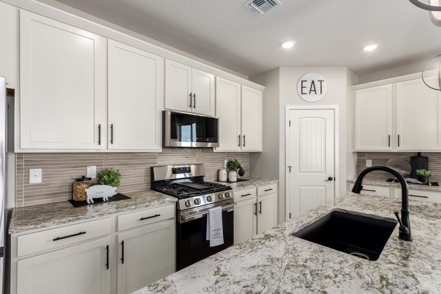 Furnished interior in a model home at Agave Springs at Teravalis in Buckeye (Image 49).