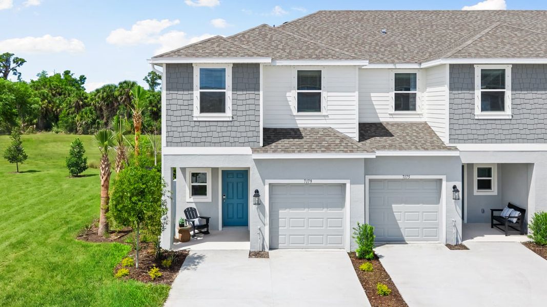 Front exterior of a home in the The Towns at Tiburon community, located in Nokomis, FL (Image 30).