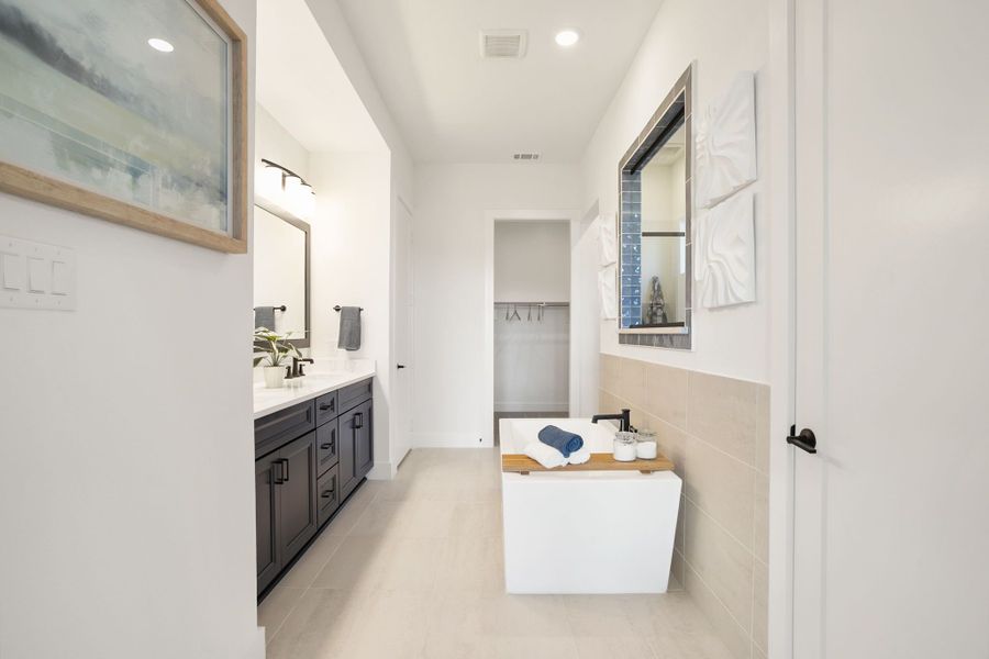 Furnished interior in a model home at Lily Creek at Sutton Fields in Aubrey (Image 78).