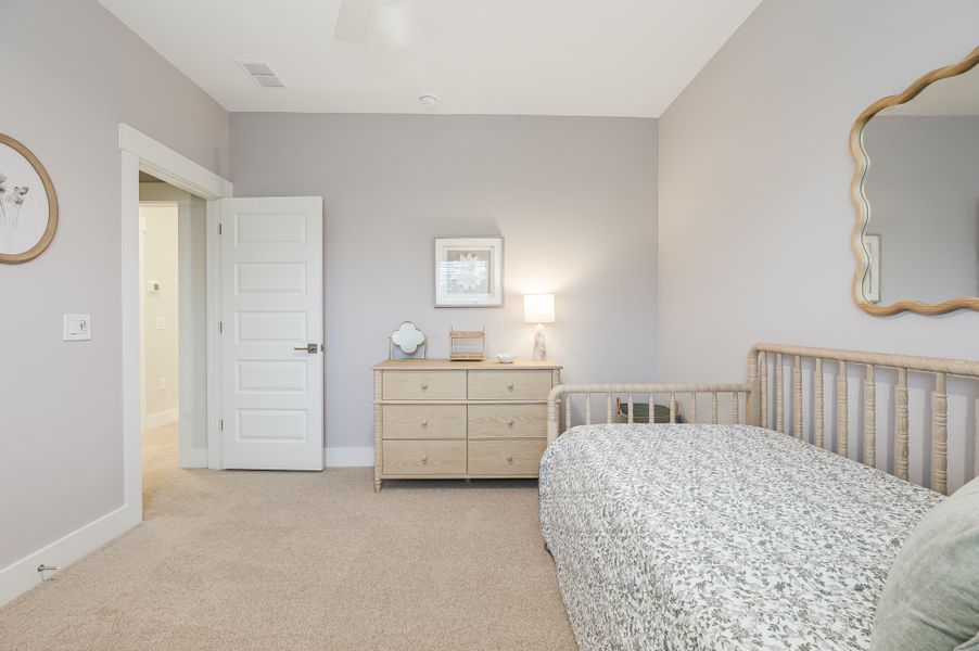 Furnished interior in a model home at Founder's Park in Summerville (Image 30).
