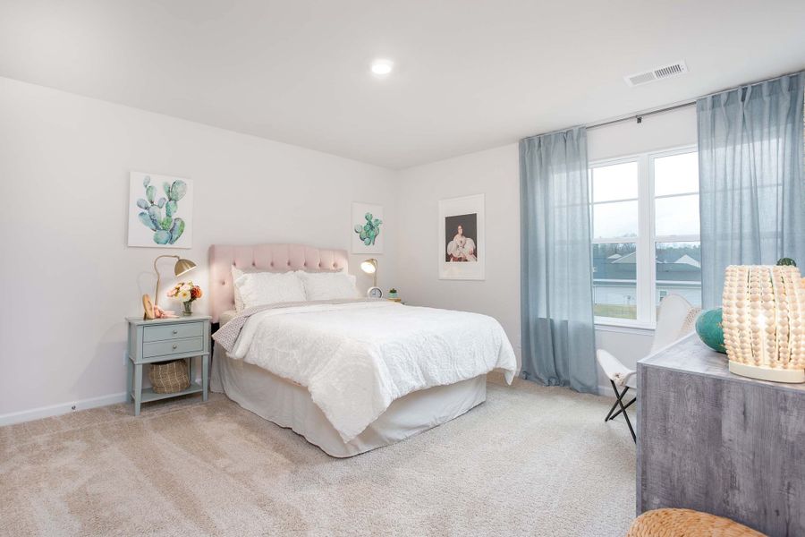 Furnished interior in a model home at Ridge Pointe in Trinity (Image 29).