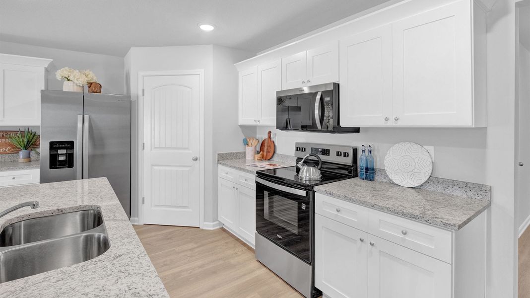 Furnished interior in a model home at Riggs Pointe in Millington (Image 14).