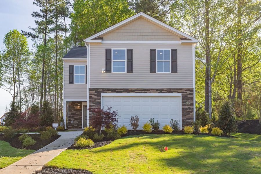 Front exterior of a home in the The Grove at Riley's Meadow community, located in Haw River, NC (Image 1).