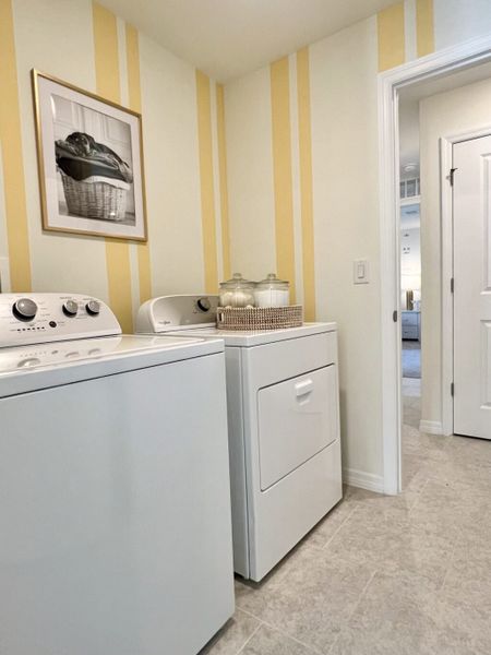 Furnished interior in a model home at Richmond Cove in Palm Bay (Image 34).