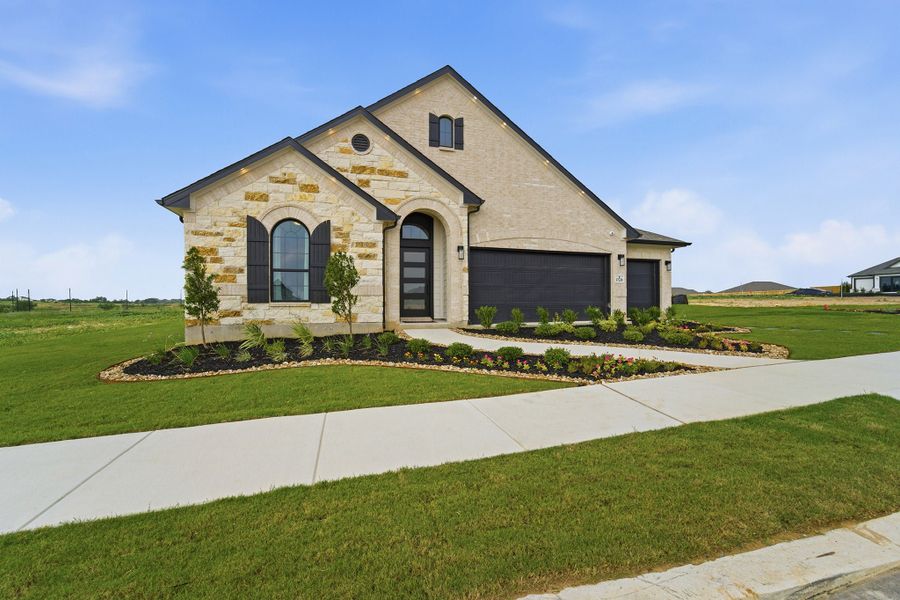 Front exterior of a home in the Hickory Ridge Estates community, located in Elmendorf, TX (Image 3).