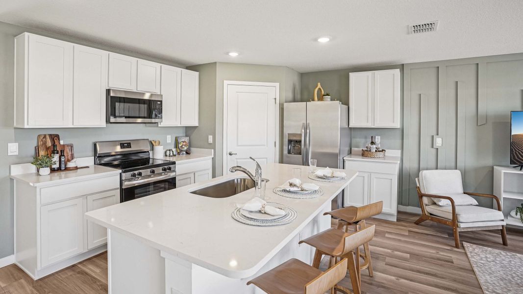 Furnished interior in a model home at Fletcher Trace in Alachua (Image 9).
