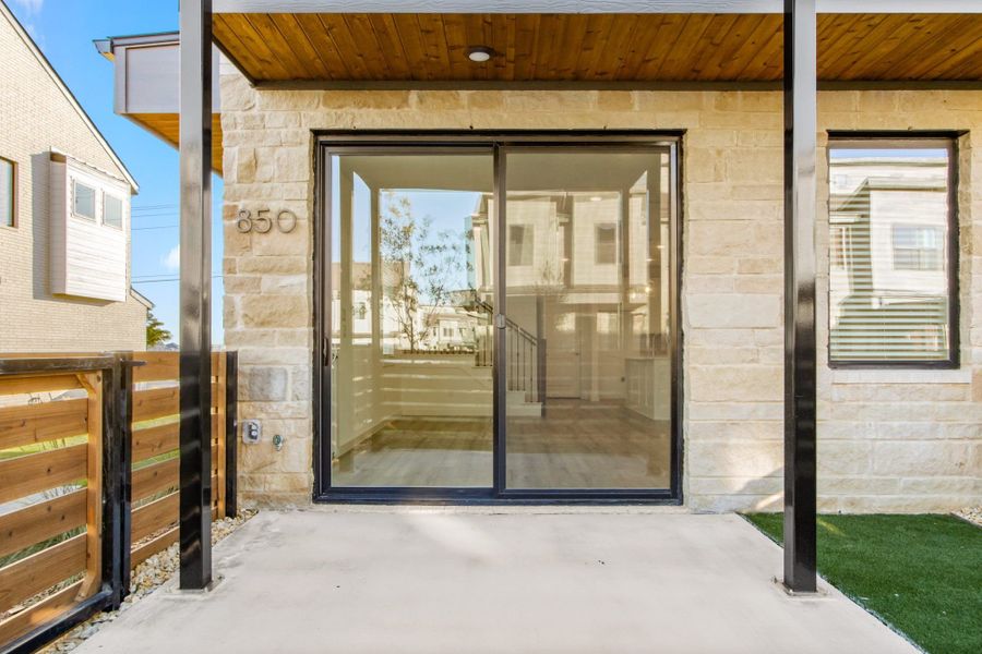 Front exterior of a home in the Windsong Ranch Townhomes community, located in Prosper, TX (Image 11).