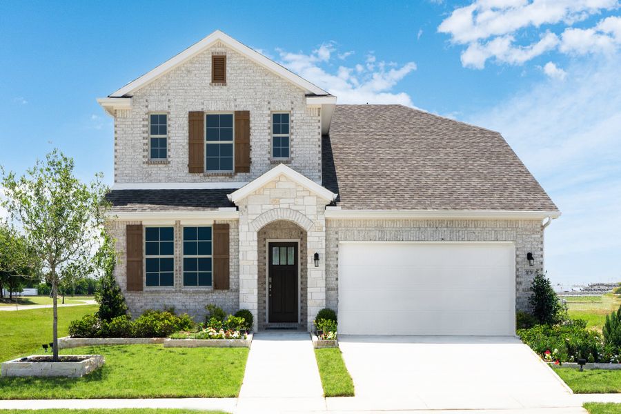 Front exterior of a home in the Verandah community, located in Royse City, TX (Image 5).