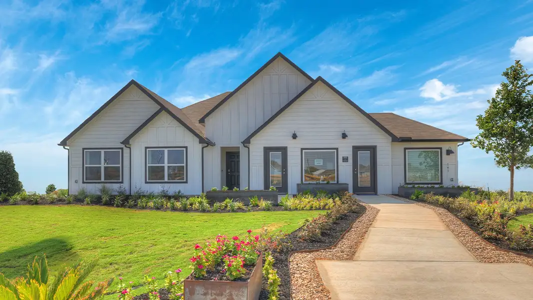 Front exterior of a home in the Hartland Ranch community, located in Lockhart, TX (Image 4).