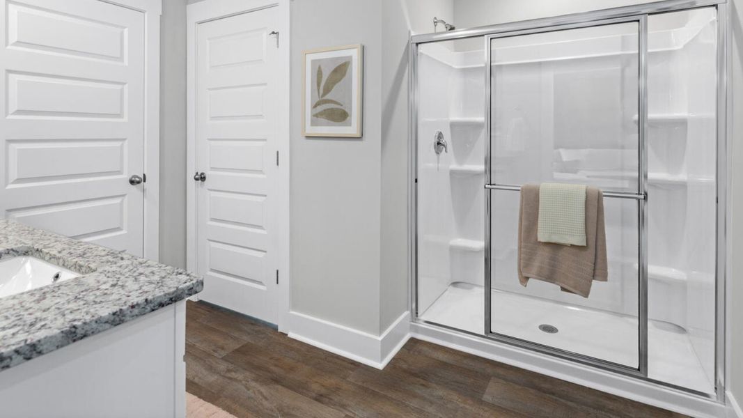 Furnished interior in a model home at Eagle Creek in Bolivia (Image 28).