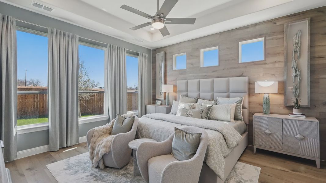 Experience luxury with wood accent walls, plush bedding, and expansive windows at Rio Vista Kelly Ranch. Experience luxury with wood accent walls, plush bedding, and expansive windows at Rio Vista Kelly Ranch.