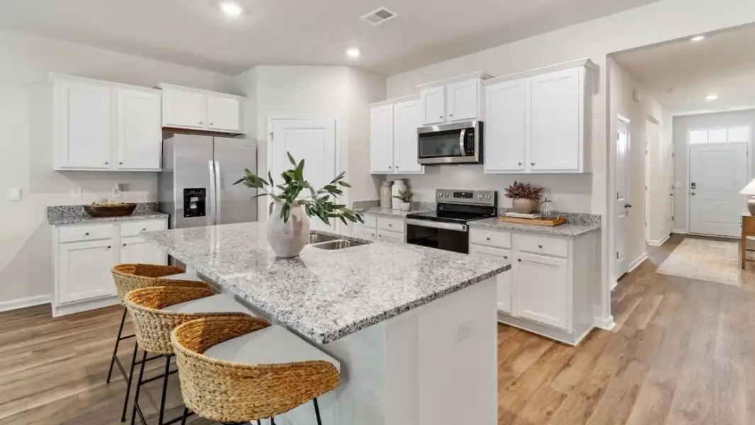 Furnished interior in a model home at Audra Oaks in Denton (Image 7).